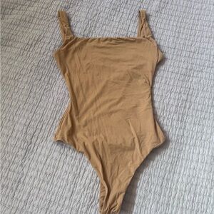 SKIMS body suit